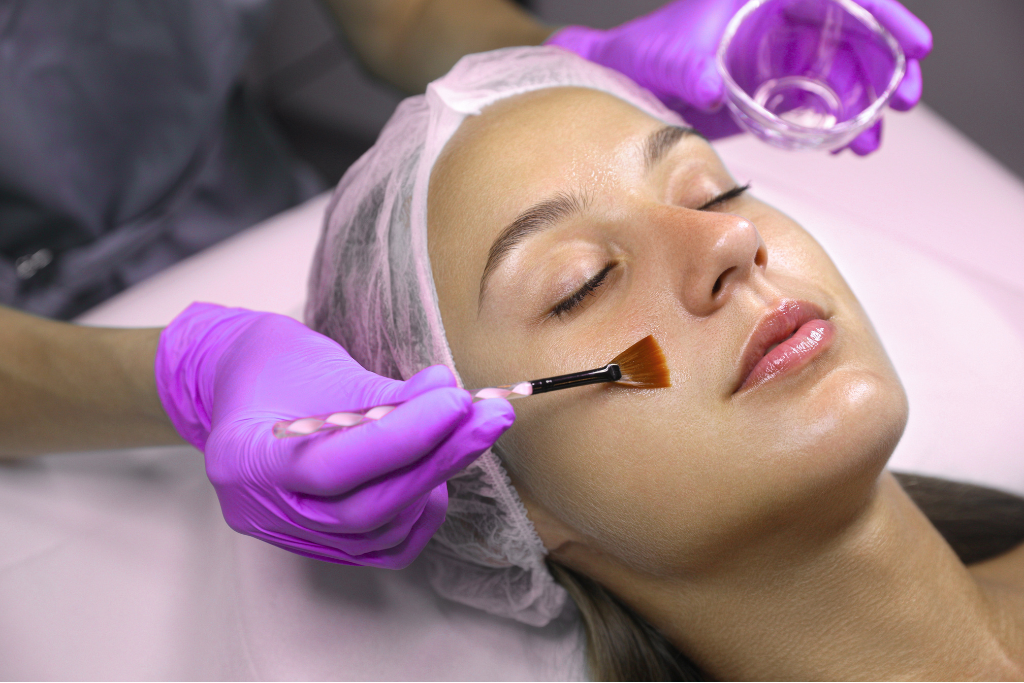 Lady Receiving chemical peel treatment at Fifth Sense Clinic Cheadle Hulme, Manchester